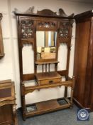A Victorian walnut mirrored hall stand,