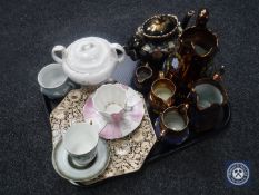 A tray of antique teapot, copper lustre ware,
