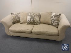 Three seater and two seater settees upholstered in two tone fabric with scatter cushions