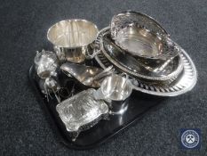 A tray of assorted plated wares : trays, serving dishes, milk jug, sugar basin,