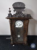 A mahogany cased Vienna style wall clock