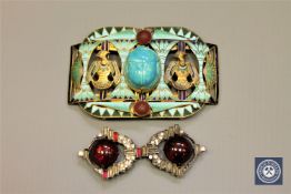 An Egyptian Revival gilt and enamelled belt buckle, in the manner of Piel Freres,