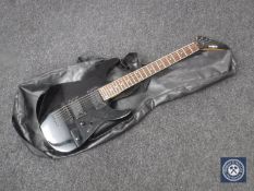 A Black Knight electric guitar in carry bag
