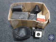 A box of assorted cameras including Kodak Brownie, Coronette,