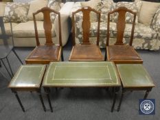 Three walnut dining chairs and a nest of tables