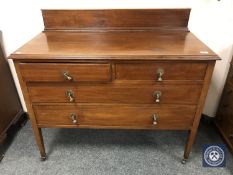 An Edwardian inlaid mahogany three-drawer dressing chest,