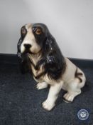 A chalk figure of a spaniel