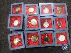 A tray of twenty-eight boxed reproduction pocket watches