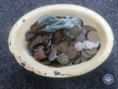An enamelled dish of pre decimal British coins including Georgian pennies