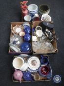 Four boxes of assorted kitchen storage jars, tea and dinner plates, glass ware, binoculars, cutlery,