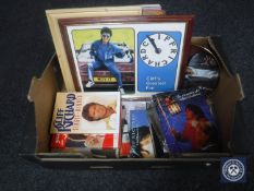 A box of Cliff Richard memorabilia including LP records, singles, books, wall clock,
