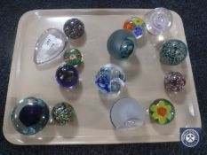 A collection of fourteen glass paperweights (14)