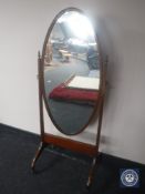 A Victorian mahogany cheval mirror