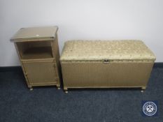 A gold loom glass topped bedside cabinet and matching blanket box