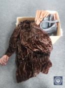 A fur coat and two boxes of leather hand bags,