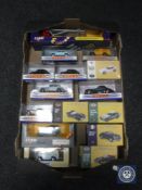 A box of boxed die cast vehicles including Corgi Volvo car transporter, Morris Minor van,
