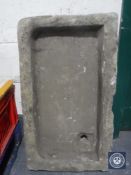 An antique stone trough
