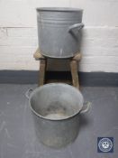 An antique pine stool and two galvanized buckets