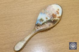 A fine quality silver and enamel dressing table brush depicting an Alpine scene