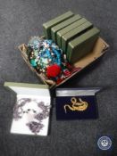 A box of assorted costume jewellery and six boxed fashion necklaces