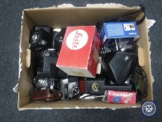 A box of assorted cameras including a boxed Leitz Leicaflex SL