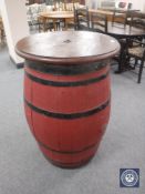 An oak coopered barrel bar table