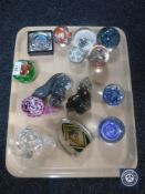 A collection of fourteen glass paperweights (14)