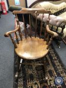An early 20th century Ibex rocking chair,