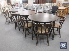 Three circular bar tables and eight tapestry upholstered elbow chairs