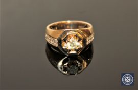 A 14ct yellow gold gent's signet ring, the central brilliant-cut diamond weighing 0.