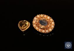 An antique gold pendant set with citrine and seed pearls,