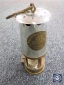A brass and chrome Eccles Protector miner's lamp,