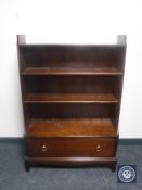 A set of Stag Minstrel open shelves fitted a drawer