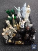 A tray of Avon perfume bottles