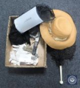A box of costume jewellery, feathers, lady's hat, hand fan,