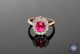 A late Victorian ruby and old-cut diamond cluster ring,