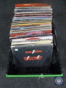 A crate of LP records : rock, Black Sabbath, Santana,