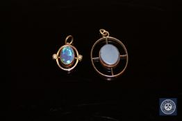 Two antique gold pendants, one set with agate,