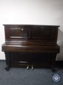 A mahogany cased overstrung piano by Bell