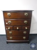 A Stag Minstrel seven drawer chest with brass handles