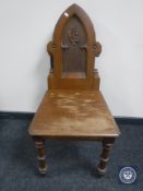 An antique oak church chair