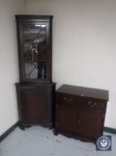 An inlaid mahogany double door cabinet fitted two drawers together with a similar corner display