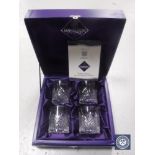 A boxed set of four Edinburgh Crystal whisky glasses