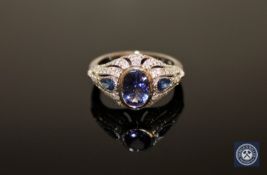 A 14ct white gold tanzanite, sapphire and diamond Art Deco style ring,