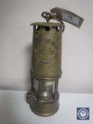 A brass Eccles Protector miner's lamp,