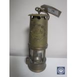 A brass Eccles Protector miner's lamp,