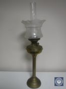 A Victorian Duplex twin burner oil lamp with glass shade and chimney CONDITION REPORT: