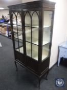 A Victorian mahogany display cabinet on cabriole legs