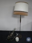 An antique brass six-branch chandelier together with a 20th century standard lamp with shade