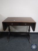 An inlaid mahogany sofa table fitted two drawers